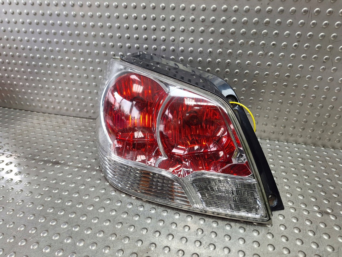 light rear part left MITSUBISHI OUTLANDER and 03-07 EUROPA