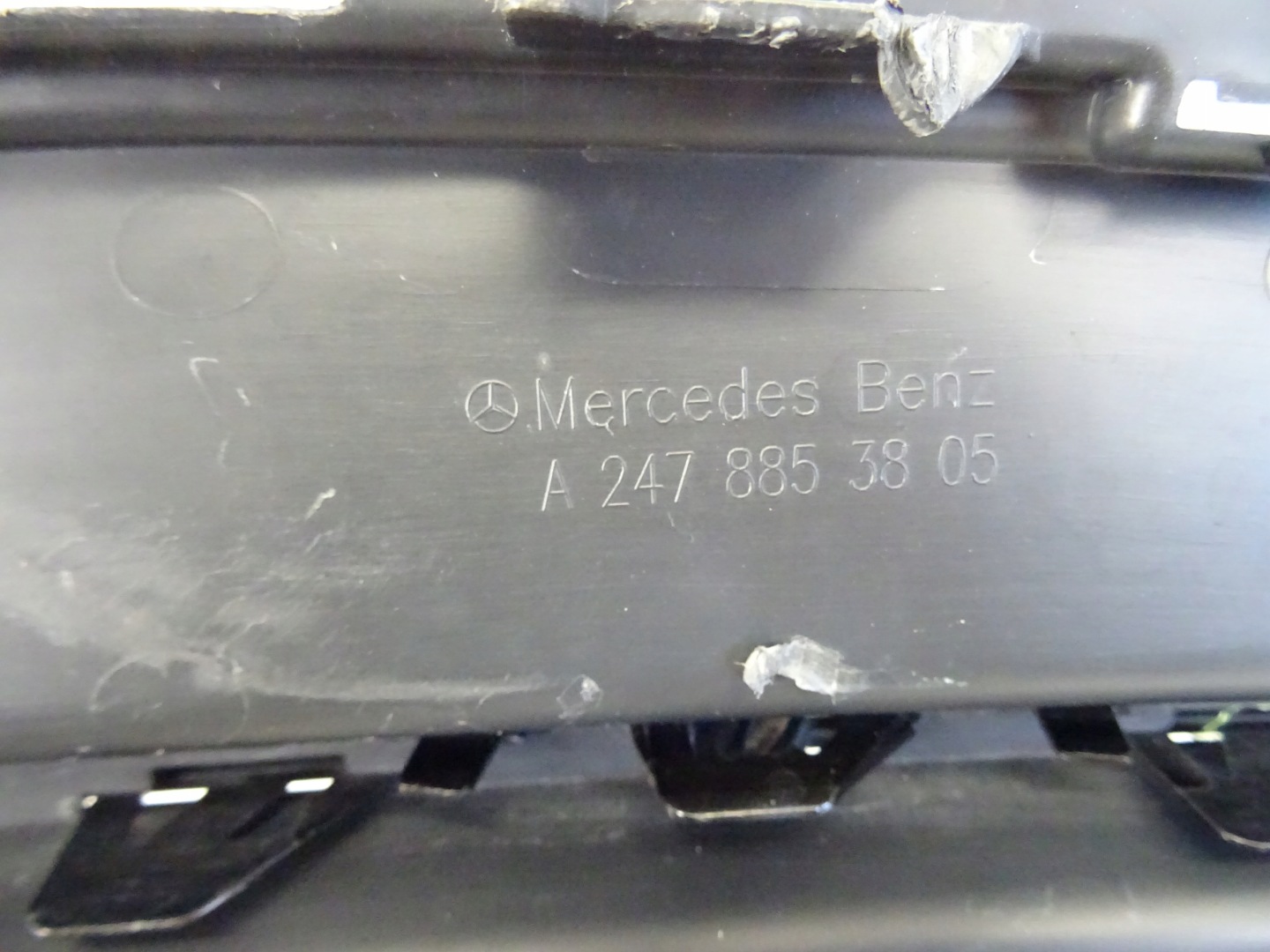grid of a bumper front front left MERCEDES GLA W247 AMG A2478853805