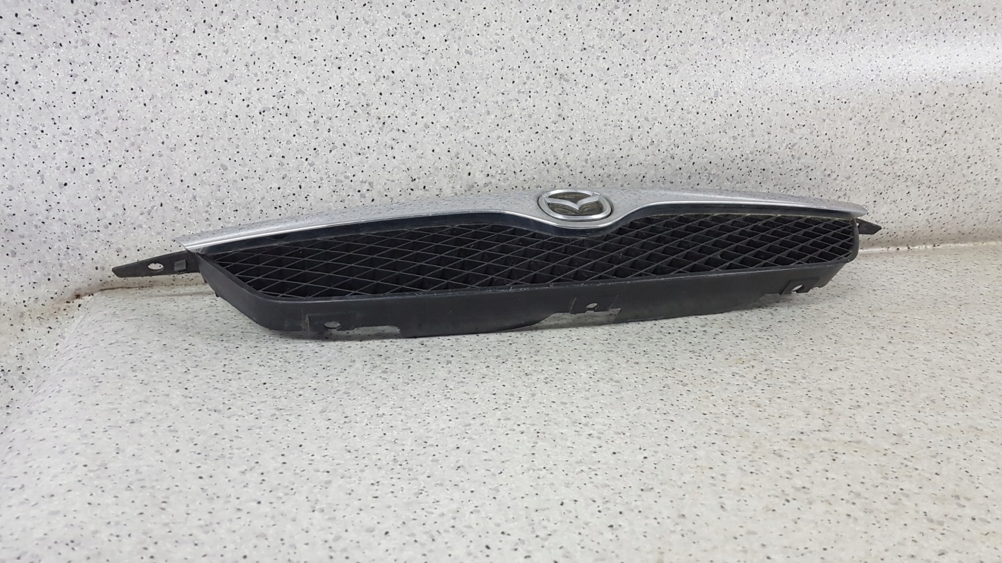 MAZDA 323 BJ 2000- grill grille + grid 2217