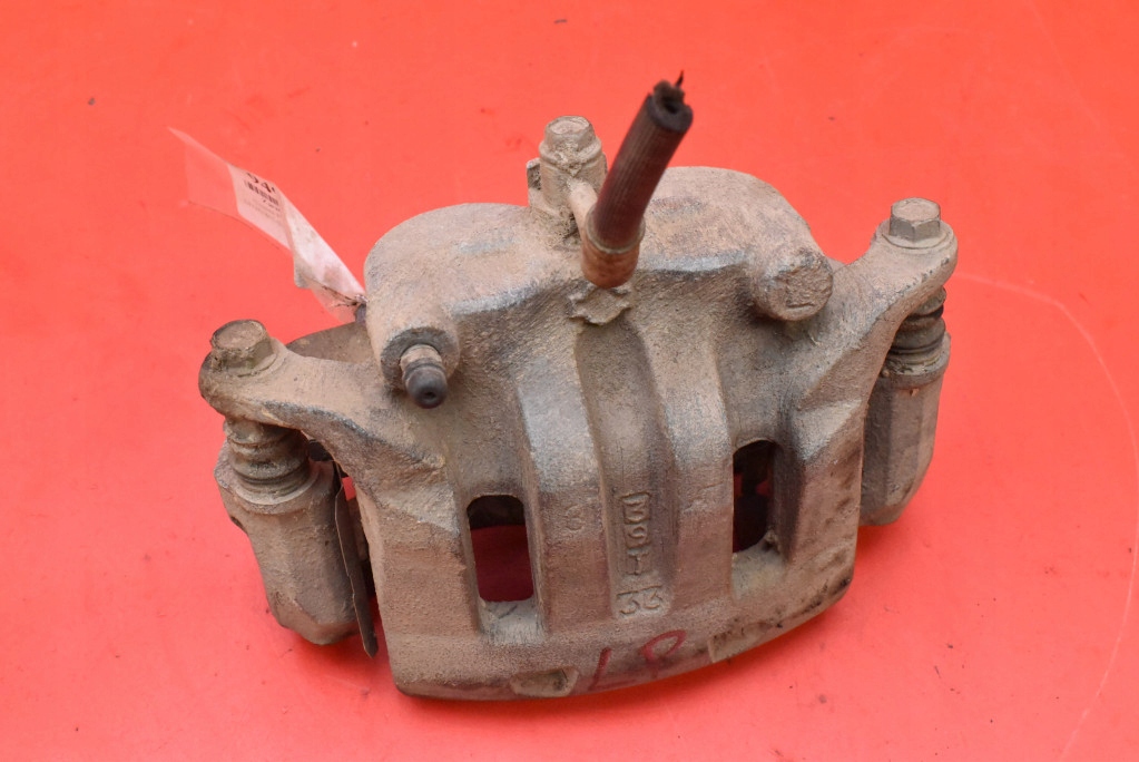 caliper brake left front NISSAN NAVARA NP300 98-06