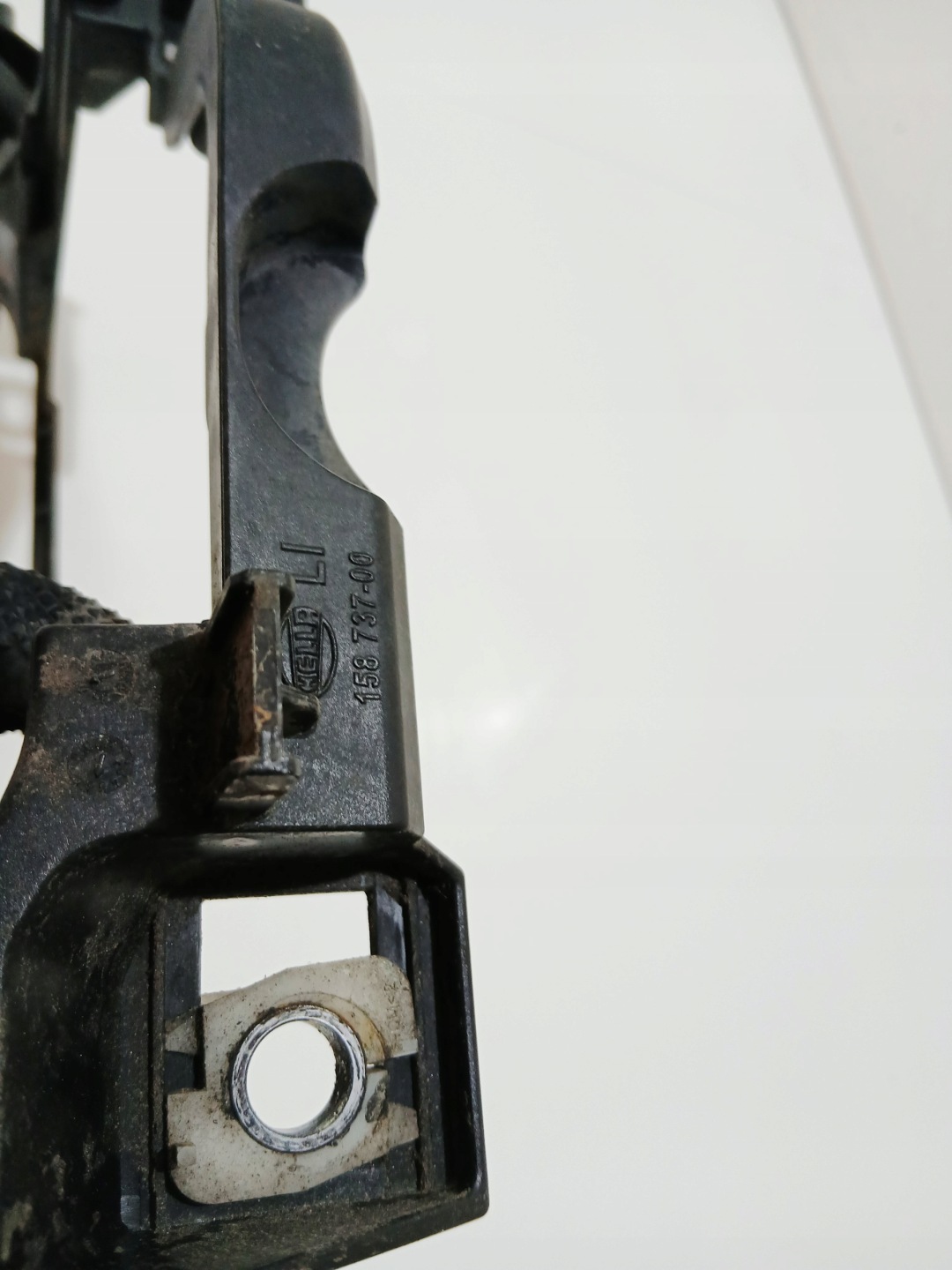 support holder lights left front BMW E60 E61 OE (0001040)