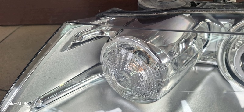 REFLEKTOR light front left VW TOUAREG BI-XENON 7L6941031C