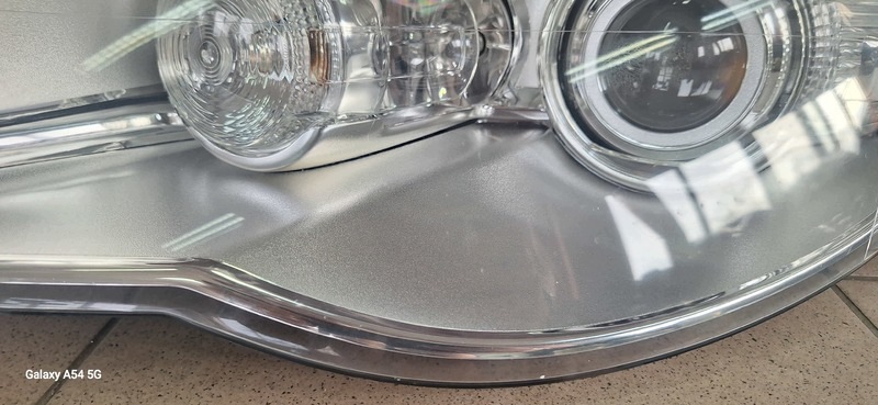 REFLEKTOR light front left VW TOUAREG BI-XENON 7L6941031C