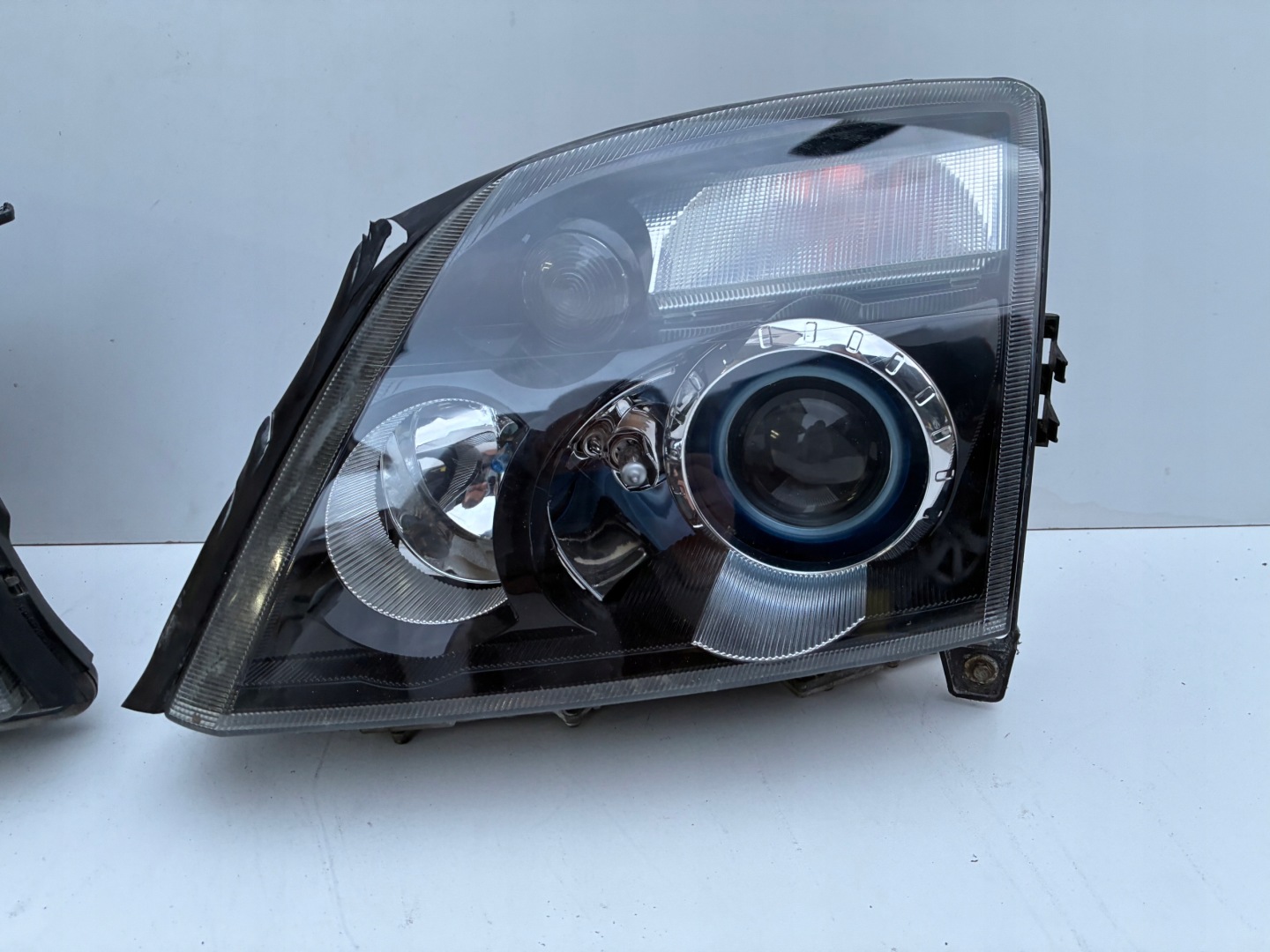 Reflektor light right left front Xenon positioning Opel VECTRA C 02-05r. OEM EU