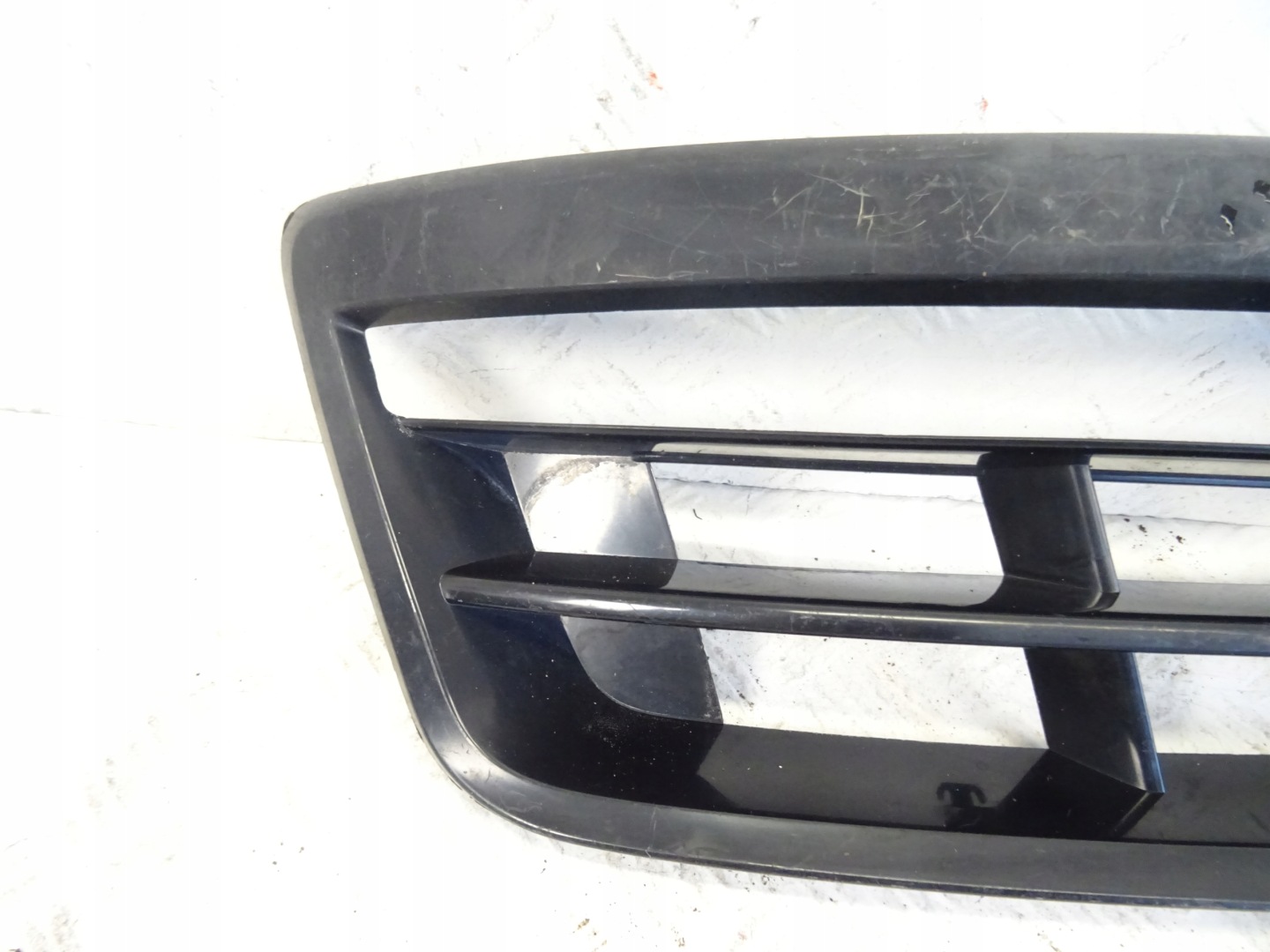 grid of a bumper front front right AUDI Q7 4L 4LO807682