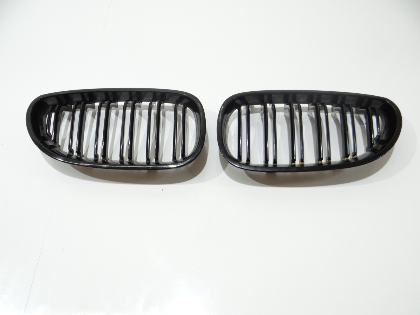 hűtőrács hip pack eleje bal BMW E60 E61 (4273389)