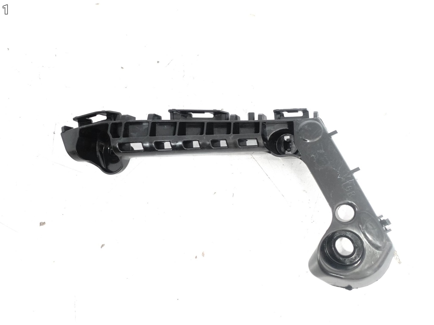 TOYOTA COROLLA E21 XII 18- support holder W bumper front right ORG