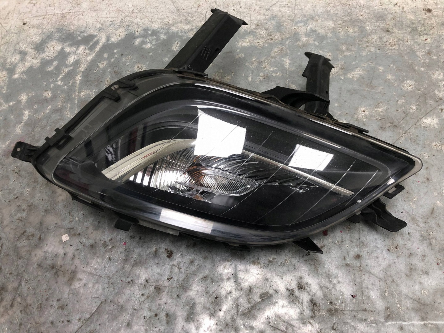 fog light left front OPEL ASTRA J KOMBI 13264641