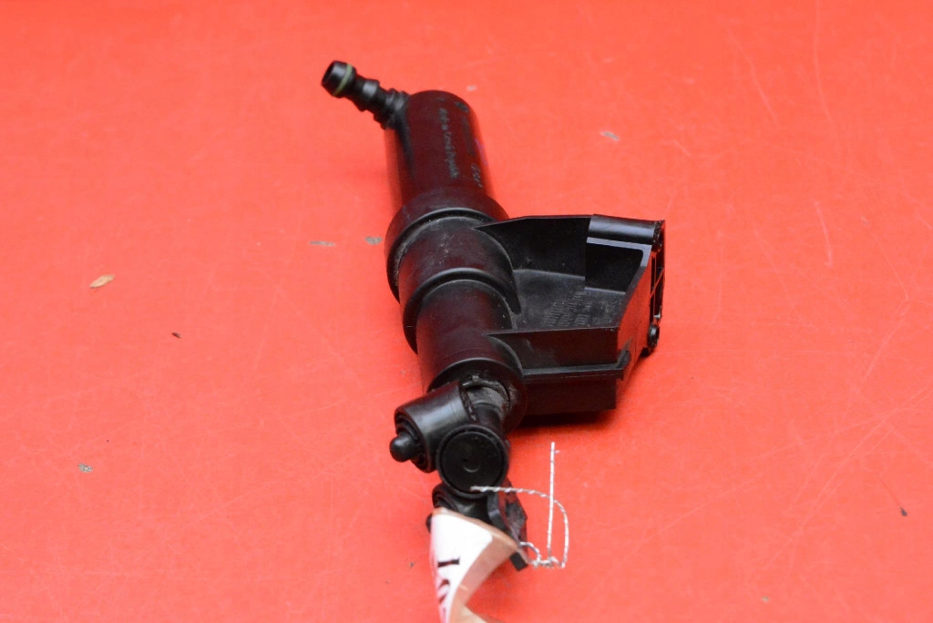 washer REFLEKTOROW left 30699012 VOLVO S40 V40 2 II 04-07