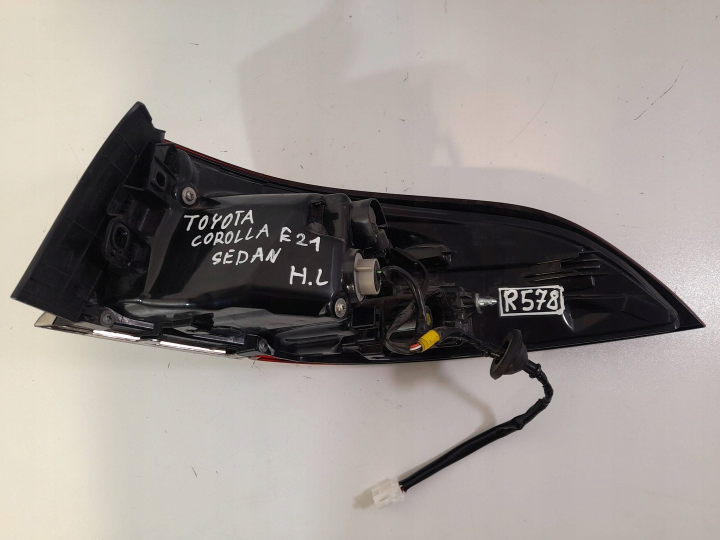 Toyota Corolla E21 sedan light rear left 8156002D1100 (R578)