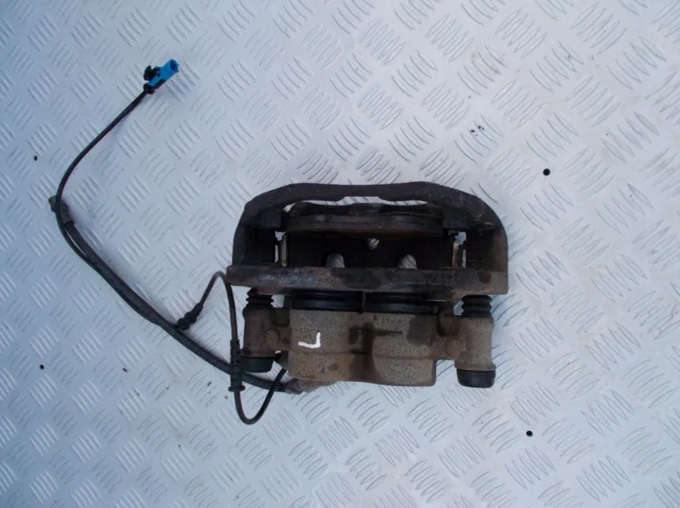 Volkswagen CRAFTER caliper - jarzmo brakes front side left OEM