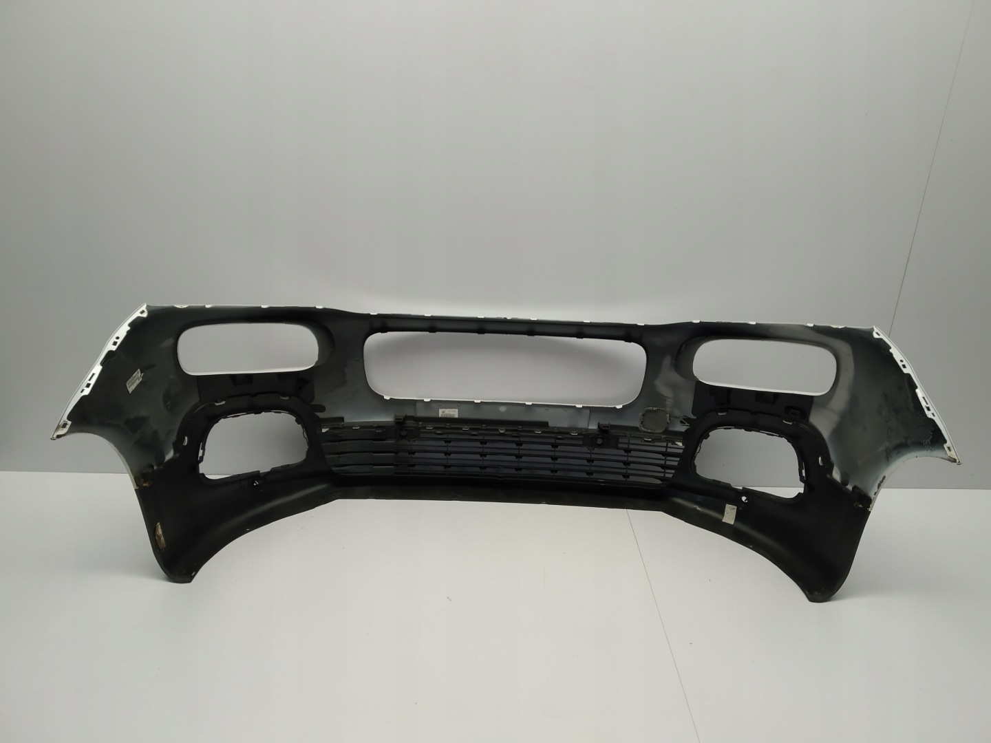 18r- Citroen Berlingo Multispace bumper front Bialy iv