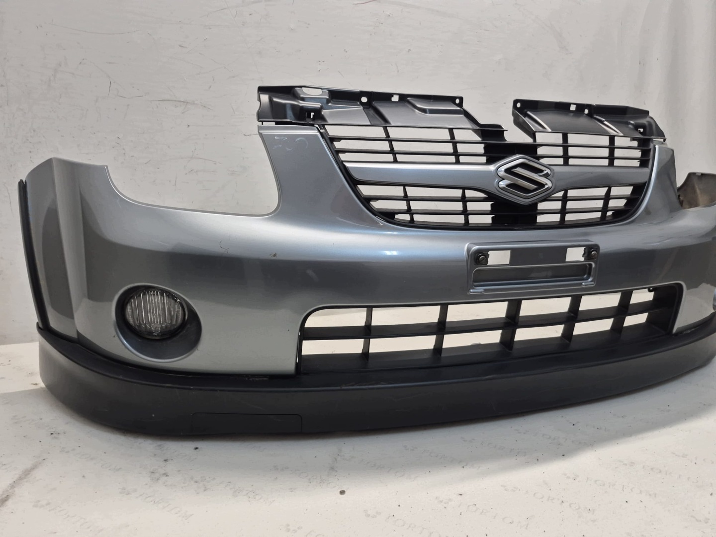 SUZUKI IGNIS II LIFT 03- bumper front front 71711-86G00 LAK.ZCD