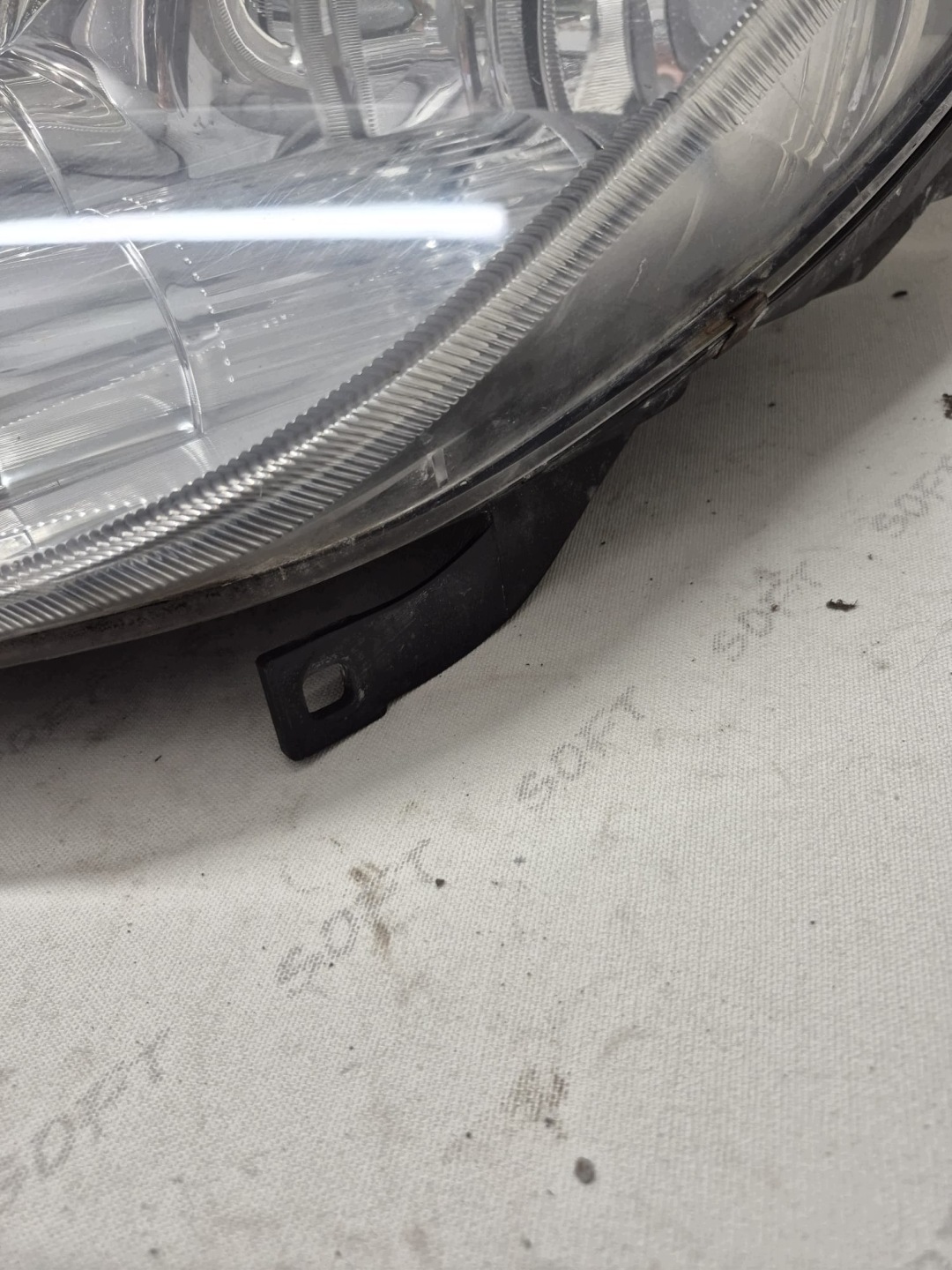 MITSUBISHI COLT 6 VI 04- light left front front MR957353
