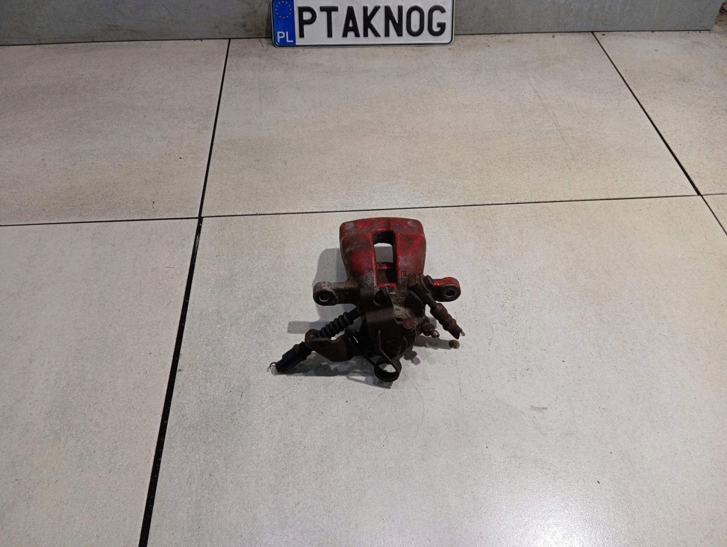 caliper OPEL left rear part ASTRA H 1.6