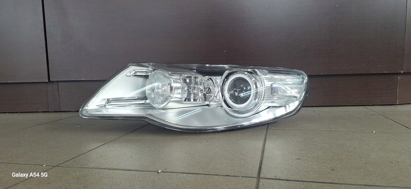 REFLEKTOR light front left VW TOUAREG BI-XENON 7L6941031C