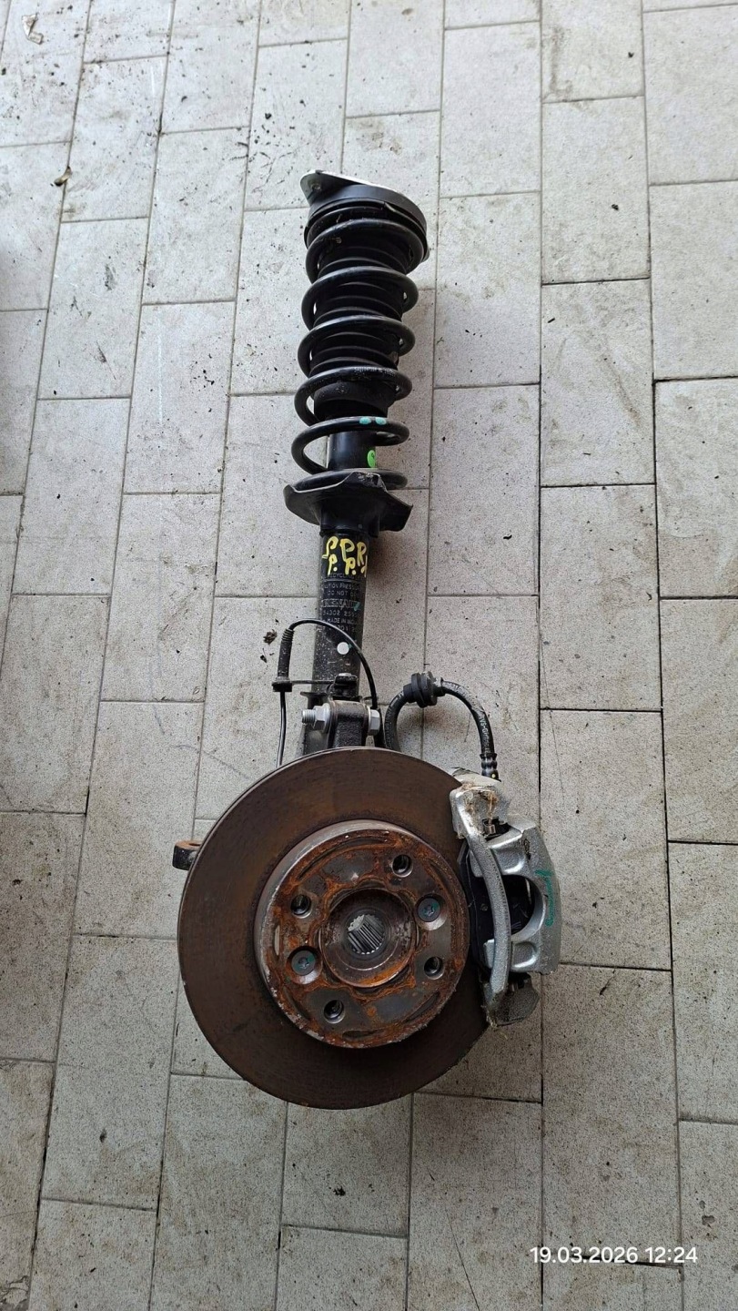 McPherson swing shock absorber front side right Dacia Spring 543022595R