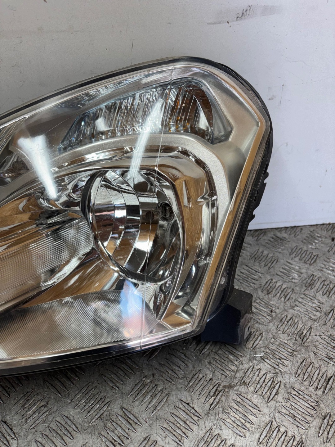 REFLEKTOR light left NISSAN QASHQAI J10 06-09
