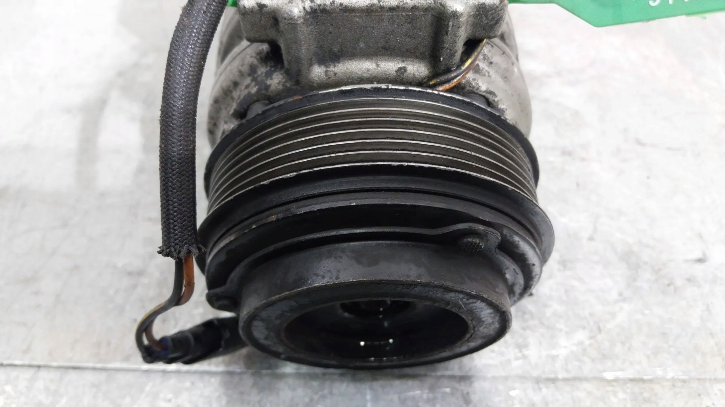 compressor compressor; of the air conditioning 92AG-19D629-AA Ford Escort