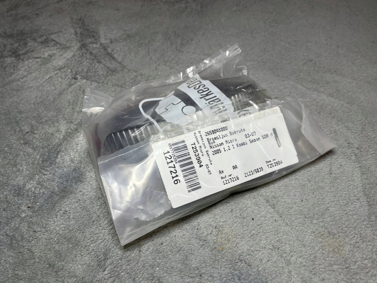 Trzecie light stop Nissan Micra 26590AX000