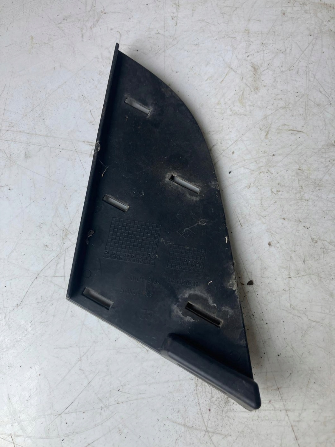 spoiler of a bumper left front RENAULT SCENIC III 623110001R