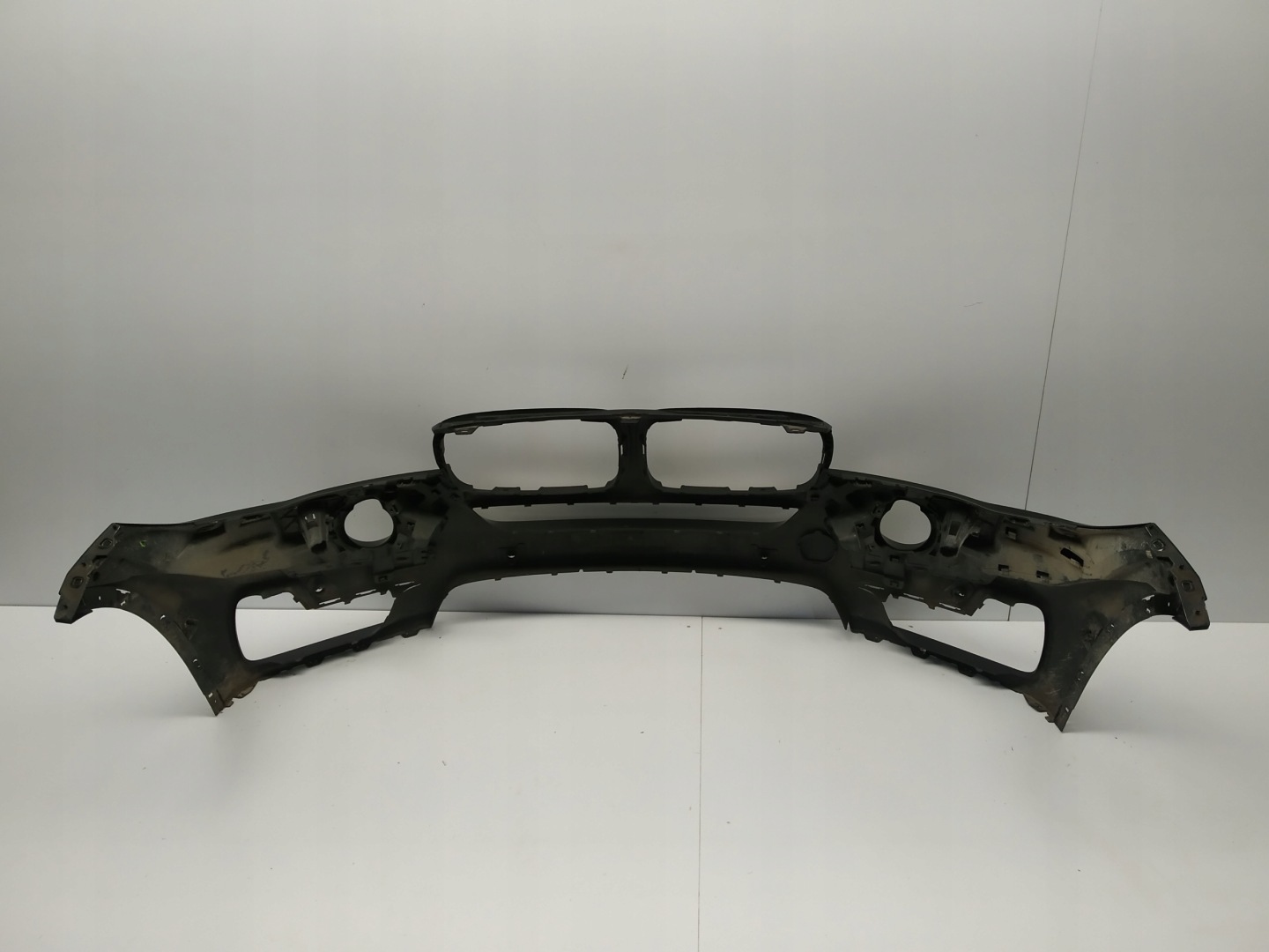 2013r- Bmw X5 F15 bumper front below 6xPdc and washers 7294480 ciemny