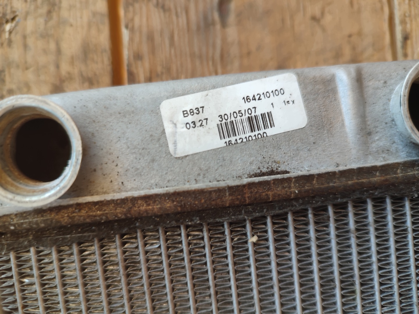 Opel Corsa D OE 164210100 ohřívač vody