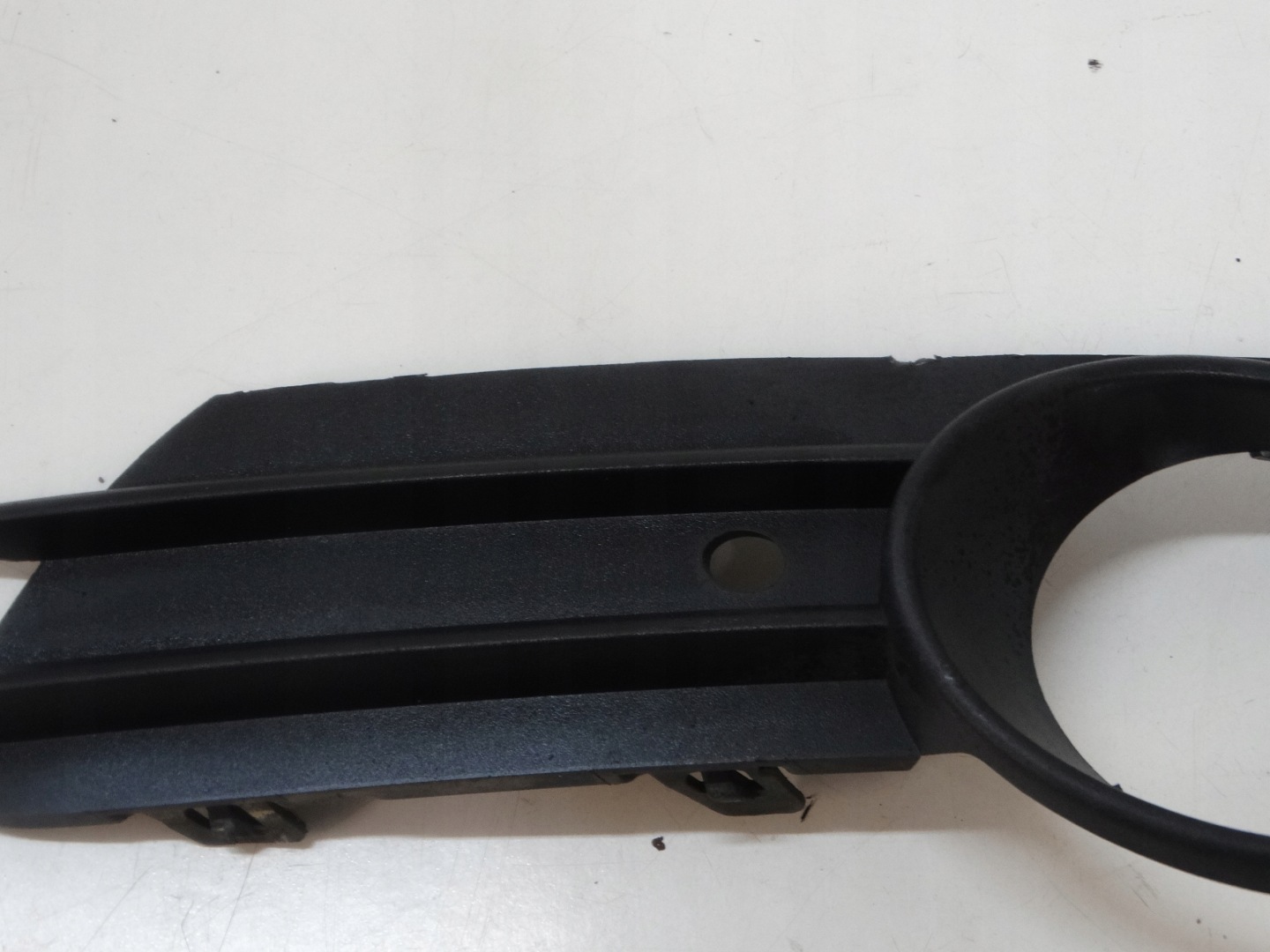 grid of a bumper left front OPEL CORSA D 13211478