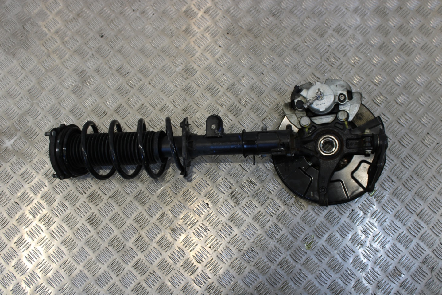 swing shock absorber McPherson left front MG ZS LIFT FL 2024