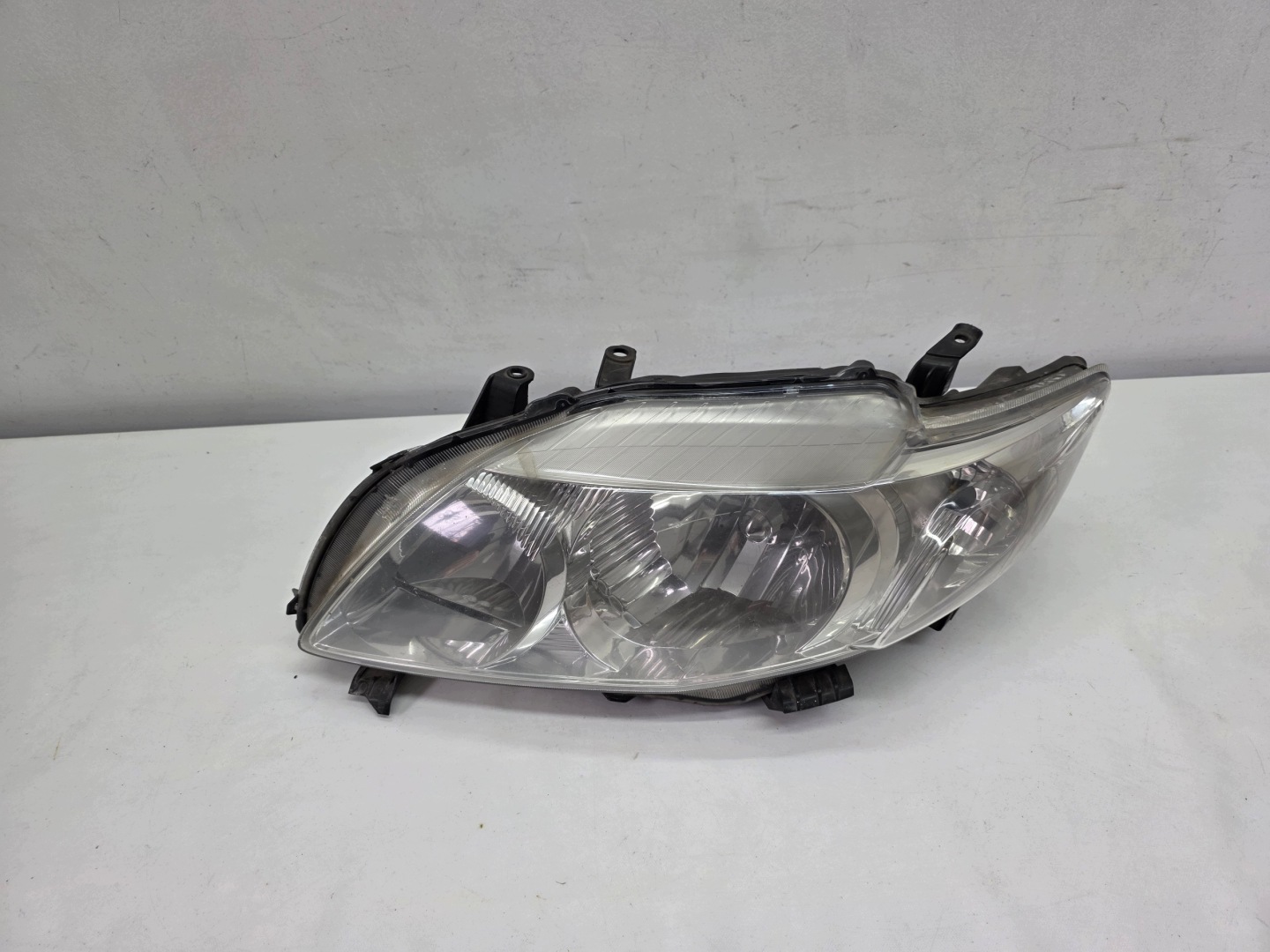 TOYOTA COROLLA E15 07-10 light REFLEKTOR left front original EUROPA