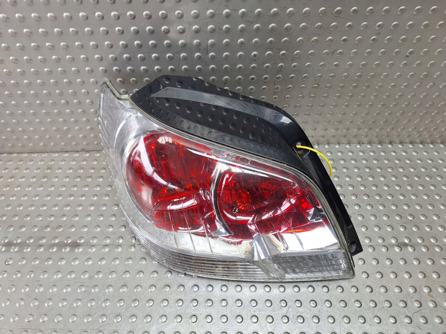 light rear part left MITSUBISHI OUTLANDER and 03-07 EUROPA