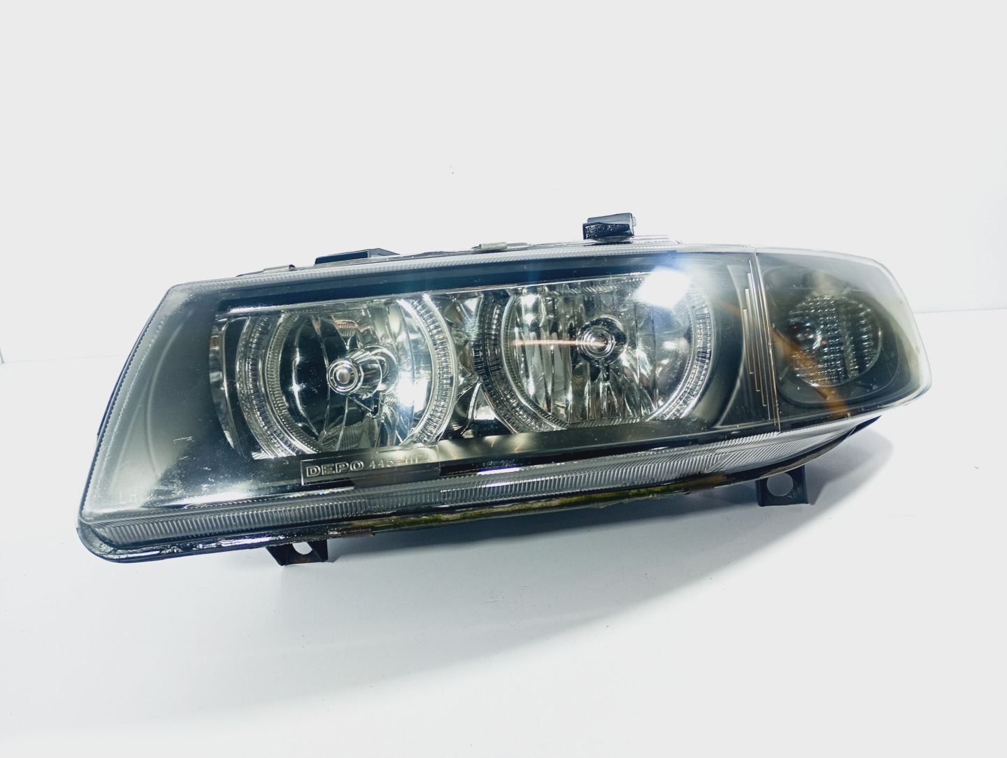 Reflektor left light left front front Seat Leon 1 and 99-06 OE 4451117L
