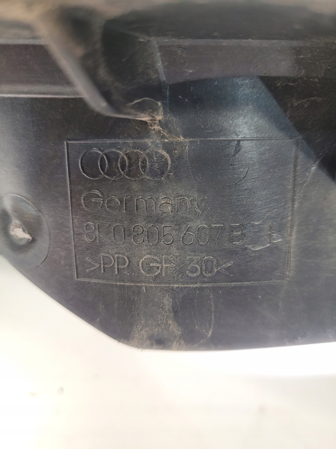 support REFLEKTORA left AUDI A4 B8 LIFT 8K0805607B