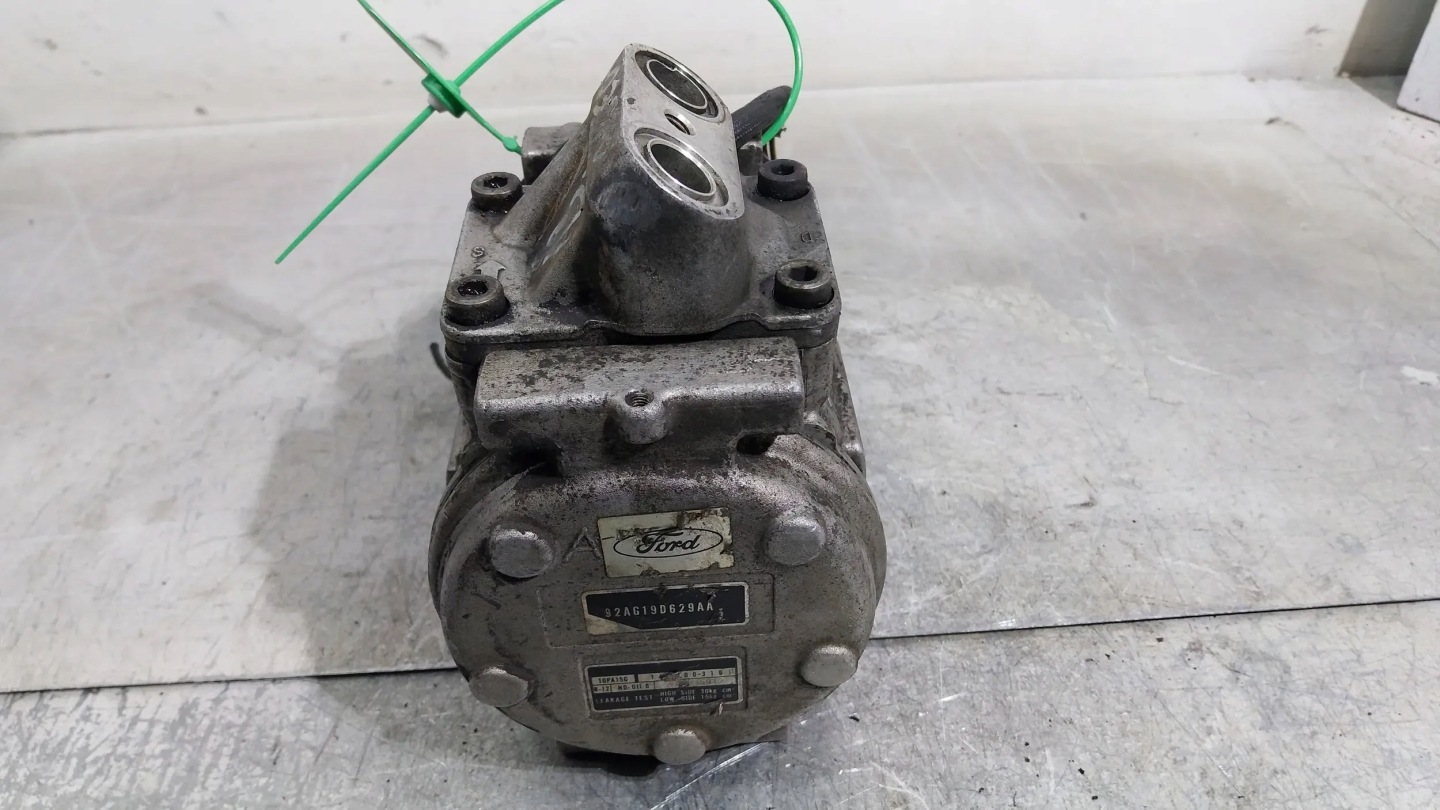 compressor compressor; of the air conditioning 92AG-19D629-AA Ford Escort