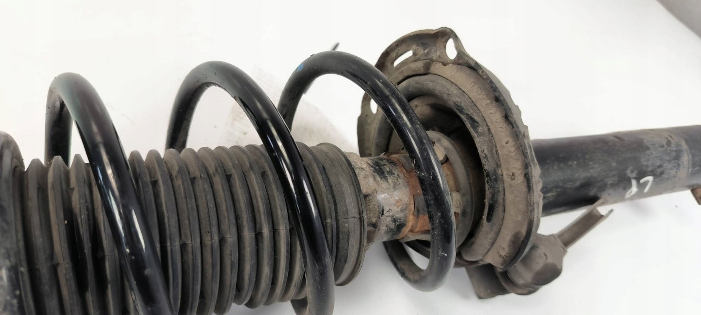 shock absorber left front SKODA OCTAVIA IV
