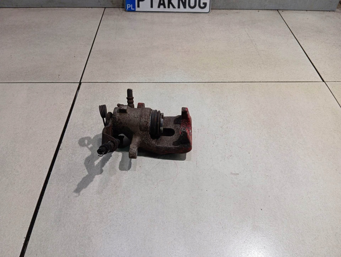 caliper OPEL left rear part ASTRA H 1.6