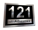 НОМЕР ДОМА с номером дома на доске.