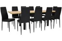 Раздвижной стол с 10 черными стульями с мягкой обивкой.