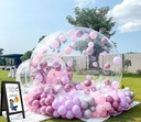Bubble House — надувной дом с вращающимися воздушными шарами.