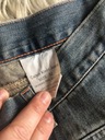 calvin klein spodnie jeansowe lekki klosz 32 Stan (wysokość w pasie) niski