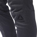 Športové nohavice Reebok Knit teplákové termoaktívne Dominujúca farba sivá