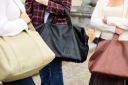 Сумка Mommy Bag Signature Vegan Leather чорного кольору з пеленальним столиком