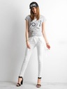 Damskie spodnie jeansowe białe 40/L Fason rurki