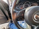 Mazda CX-5 2.2 170Ps Ledy Navi Po Liftingu 4x... Wyposażenie - komfort Elektryczne szyby przednie Elektryczne szyby tylne Elektrycznie ustawiane lusterka Podgrzewane lusterka boczne Podgrzewane przednie siedzenia Podgrzewane tylne siedzenia Przyciemniane szyby Tapicerka tekstylna Wielofunkcyjna kierownica Wspomaganie kierownicy Skórzana kierownica