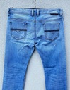 Diesel SAFADO W33 L34 stylowe jasne błękitne spodnie jeansowe Szerokość w pasie 44.8 cm