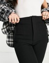 Čierne nohavice s priliehavým strihom defekt 38 Veľkosť 38