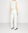 Dámske miléniové nohavice DKNY mliečne 14 eu44 Pohlavie Výrobok pre ženy