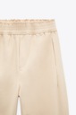 Zara nohavice z technickej tkaniny krémové S športové baggy Strih baggy