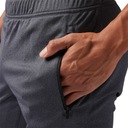 Športové nohavice Reebok Knit teplákové termoaktívne Ďalšie vlastnosti vrecká zipsy na nohaviciach