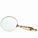 Увеличительное стекло с золотой ручкой в ​​стиле ретро